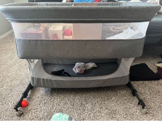 bassinet plus everything in it