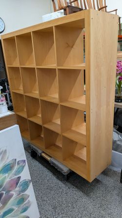 Ikea. Kallax 4x4. 59 in by 59 in. Located in the city of Orange