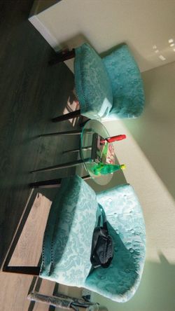 Chairs And Glass Coffee Table