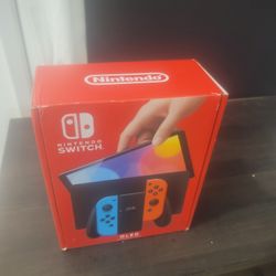 NINTENDO SWITCH OLED NEON RED AND BLUE BRAND NEW FACTORY SEALED 