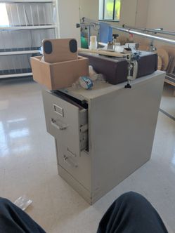 Filing cabinet locking with key and a whole bunch of brand new folders inside