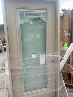 36 x 80 inch left Hand inswing exterior door with built in blinds.