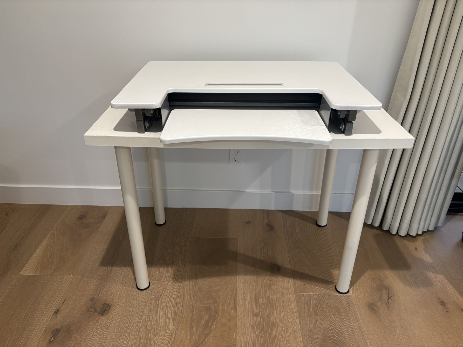 Desk and sit to stand converter