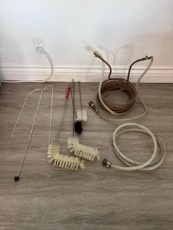 copper wort chiller + misc cleaning brushes and beer brewing equipment
