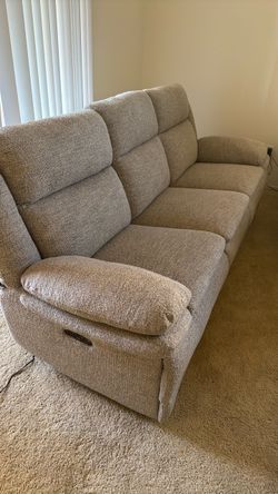 Used (new condition) gray power recliner sofa