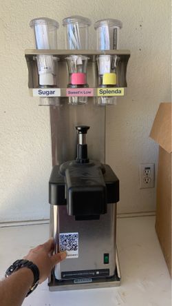 Coffee condiment dispenser