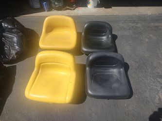 Two John Deere seats three Craftsman that will also fit other machines