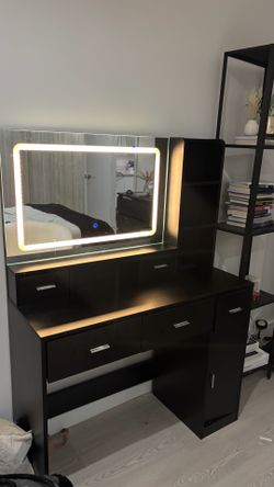 Black makeup vanity desk with 3 dimmable light settings and storage