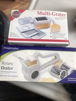 Hand held multi use grater and cheese grater. Brand new