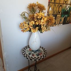 White Vase With Yellow Artificial Flowers