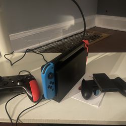 Nitendo. Switch With Controller And 2 Games Can Deliver For Small Fee