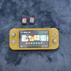 Nintendo Switch Lite With 2 Games 