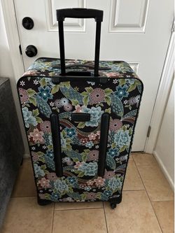 Large blue and brown suite case