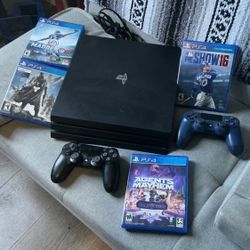 PS4 Pro Bundle with 2 Controllers and 4 Games