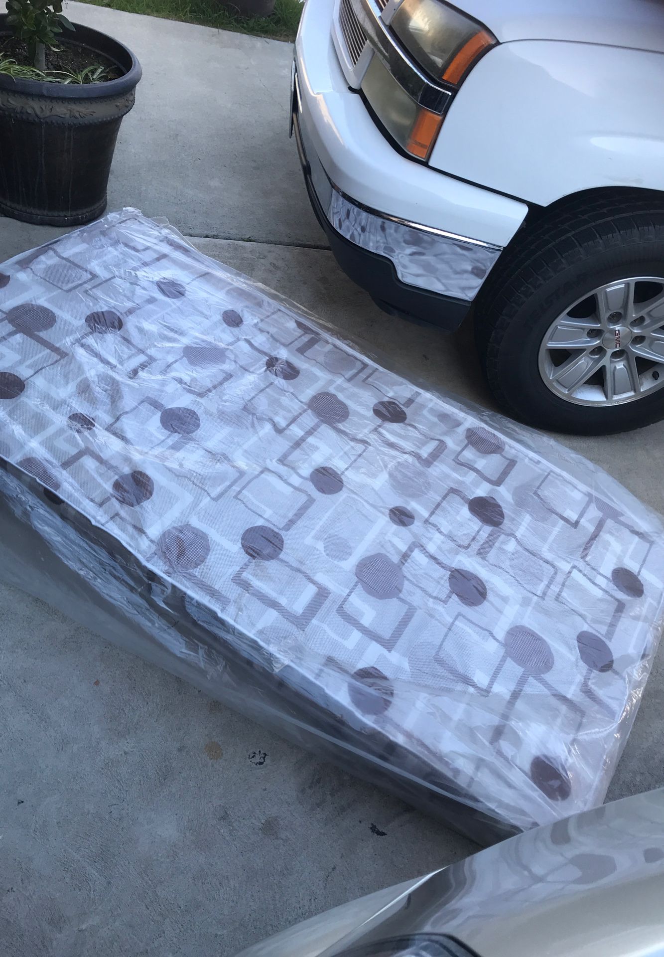 FREE twin size mattress really good condition still wrapped in plastic bag.