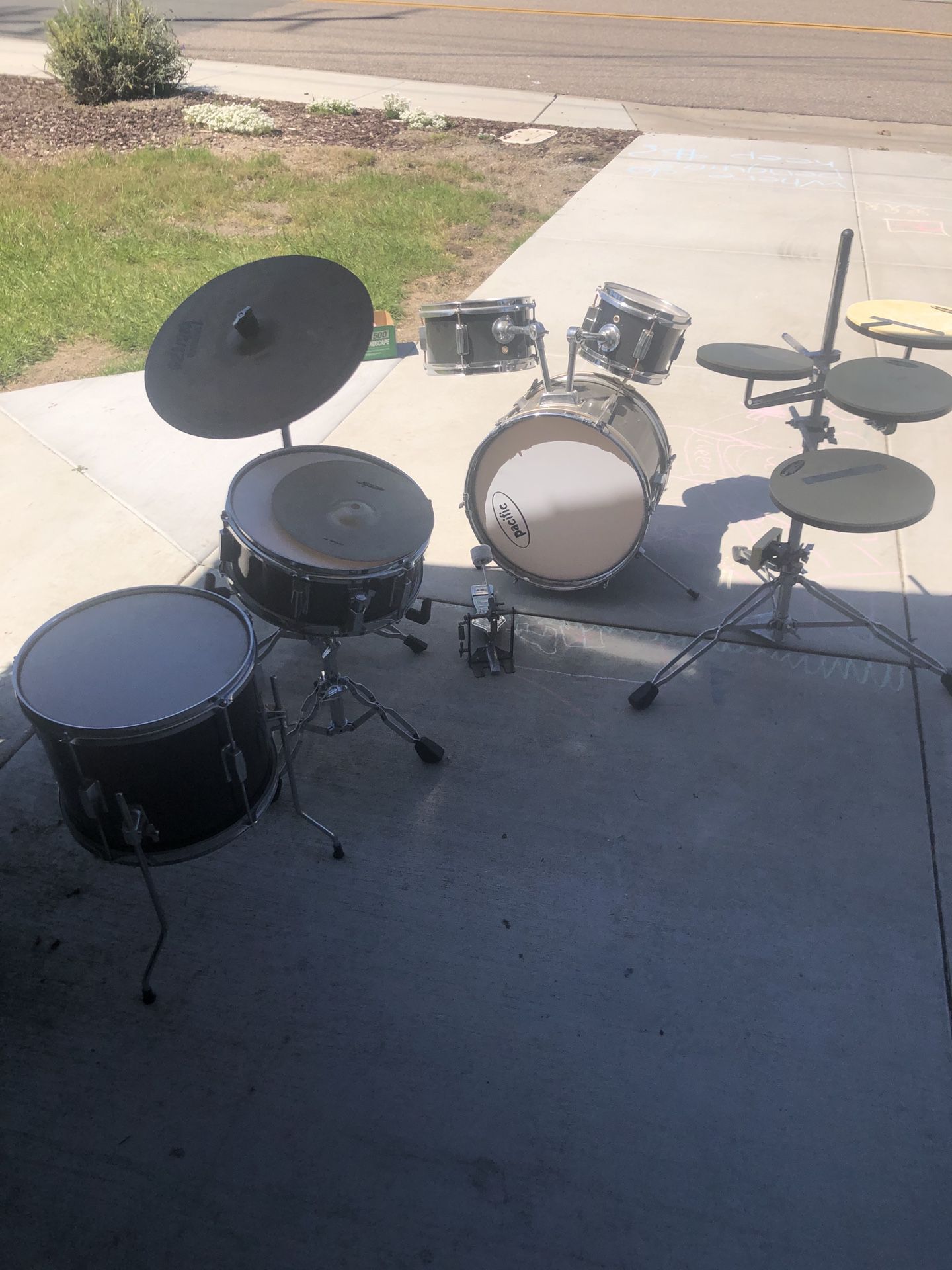 Drum set for sale. $70 or best offer. The practice pads are no longer available with the drum set.