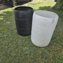 2 plastic scrap barrels with holes drilled in it for drainage.