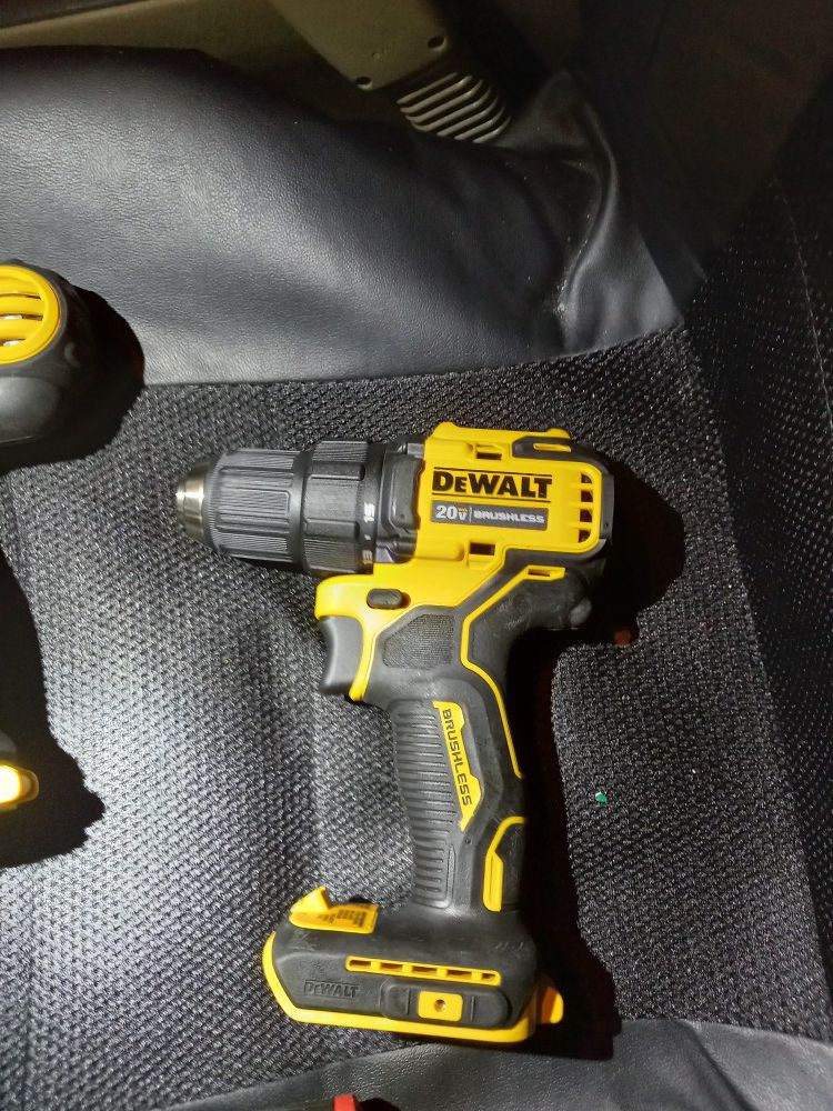 Two 20v Brand New (without box or batteries) Dewalt drills. And a 12v Brand new Milwaukee Multi Tool