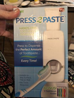 Press 2 Paste Toothpaste dispenser as seen on tv NEW $10