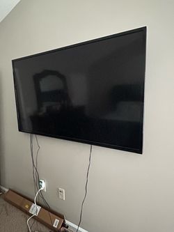 TVs and beds for sale