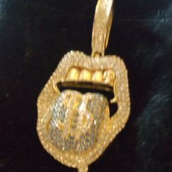  Dollar Sign Tongue Pendent And Jesus Peice