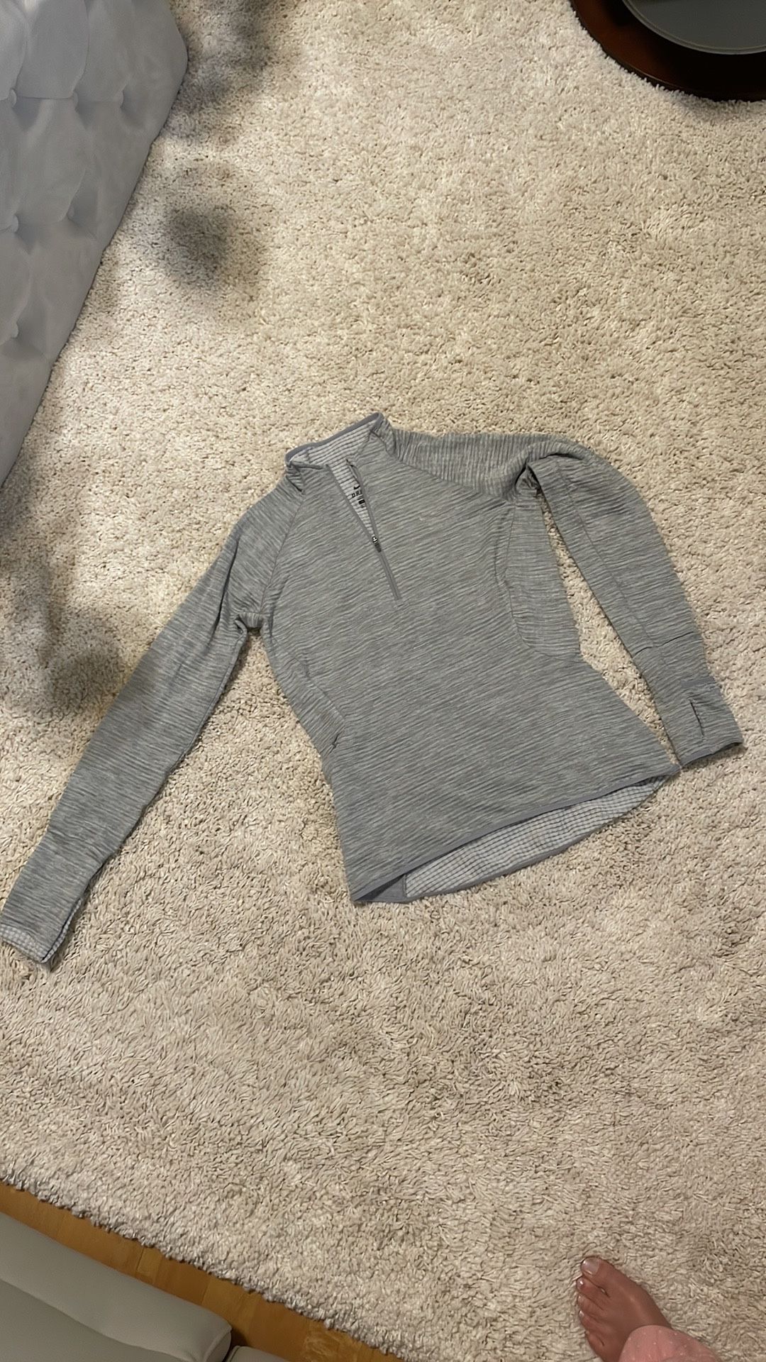 Nike dri fit gray long sleeve top shirt women athletic xsmall like new Wore once like a thin fleece material inside. Zip side pocket