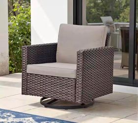 Patio Brown Wicker Outdoor Rocking Swivel Chair Glider with Gray Cushions.   retail price $172 our price is 100   Pocassy Model # PJUXJ-3XT   L-4840
