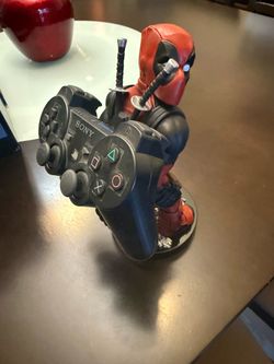 Deadpool controller and/or cell phone holder