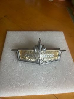 73 Caprice emblem