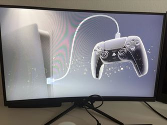 Black PlayStation five with black controller Black PlayStation five with black controller