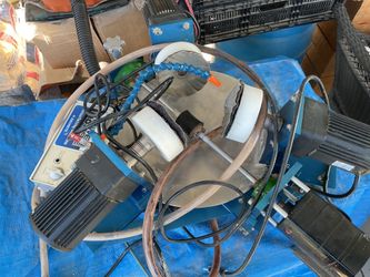 Bowling ball resurfacing machine
