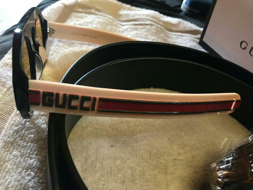 Brand new Gucci sunglasses and brand new Gucci belt