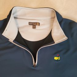 Peter Millar Masters 1/4 zip pullover in Navy blue.