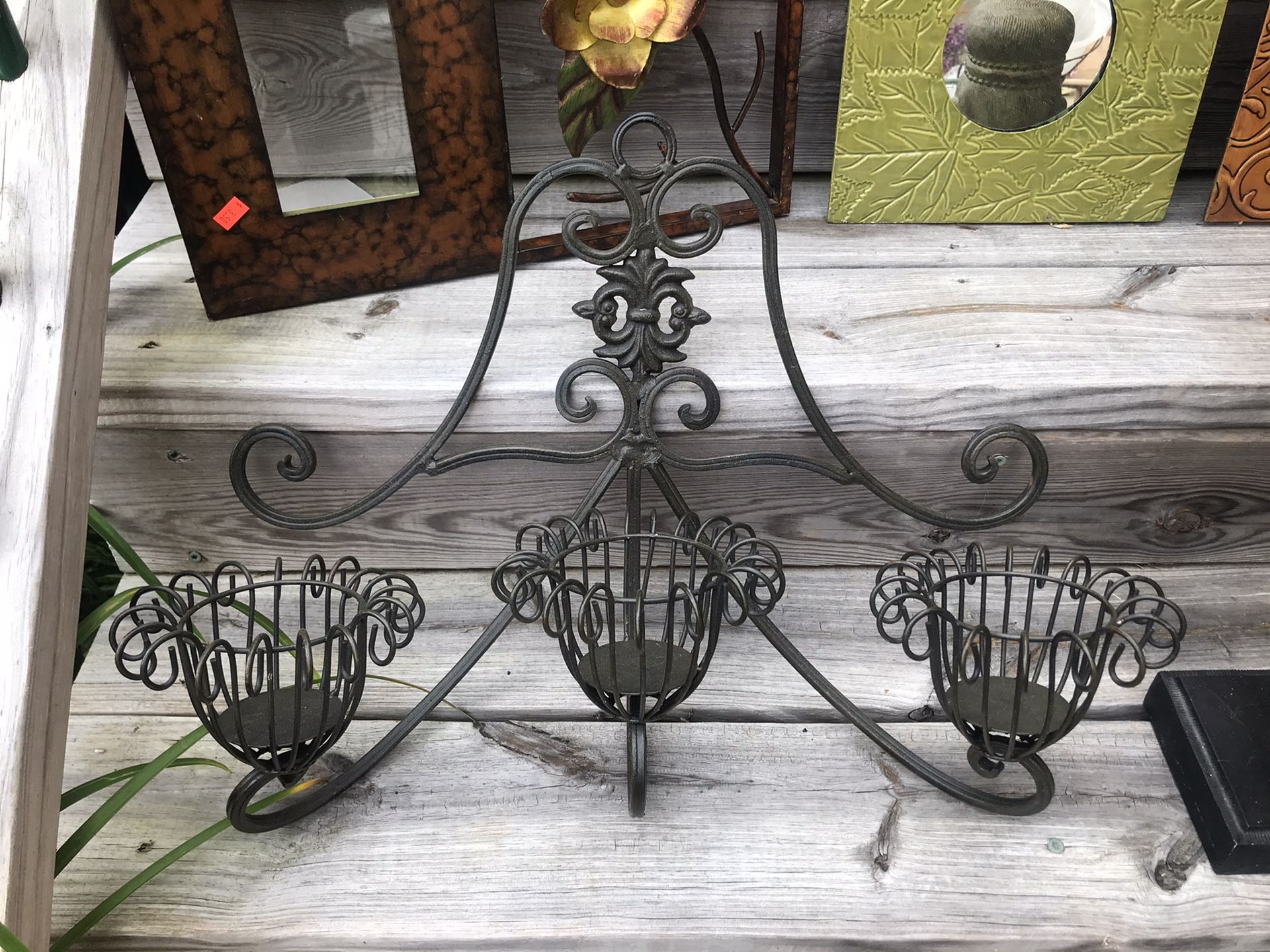 Metal wall candle holder