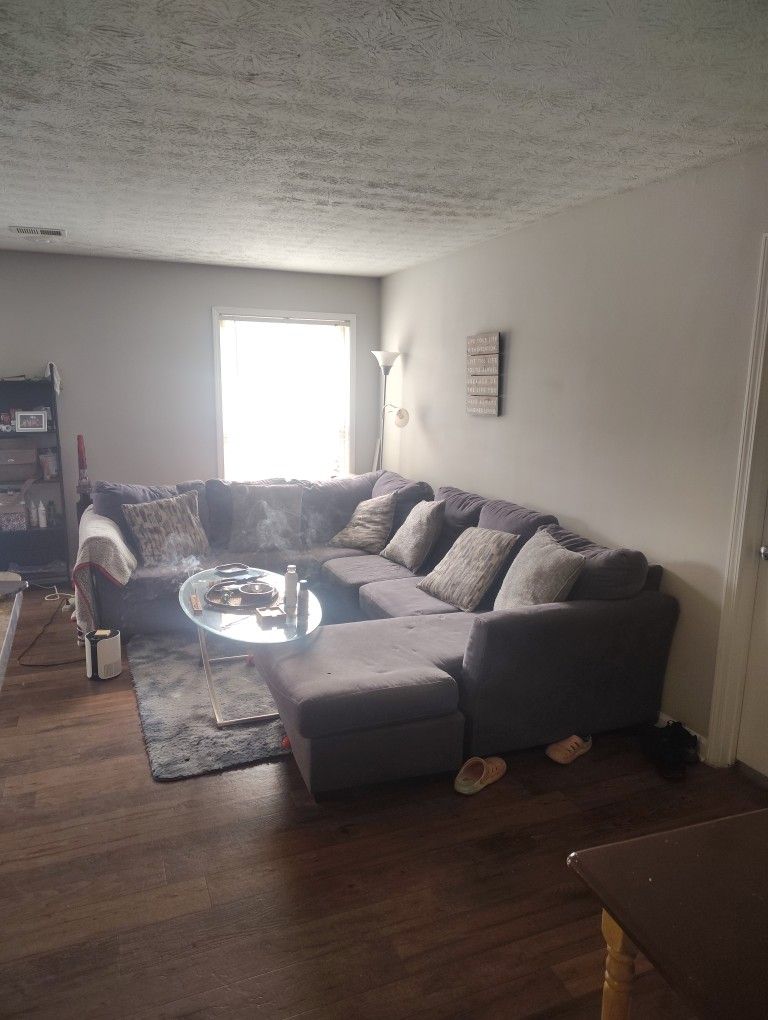 Wrap Around Couch And Table