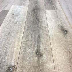 Rustic grey 8mm Laminate flooring w/pad $2.69/sf