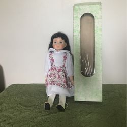 old porcelain doll with her box