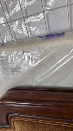 Brand new Mini crib in white with mattress
