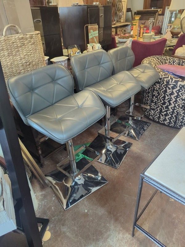 Three Gray Up And Down Stools