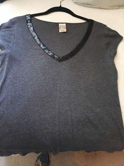 Vintage "Weavers girl" Dark grey T-shirt with low cut v-neck black sequins in front. Size X/L.