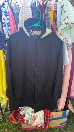 A small Black hooded raincoat used Towne Colection