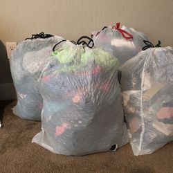 Bags Of Women And Mens Cloths 