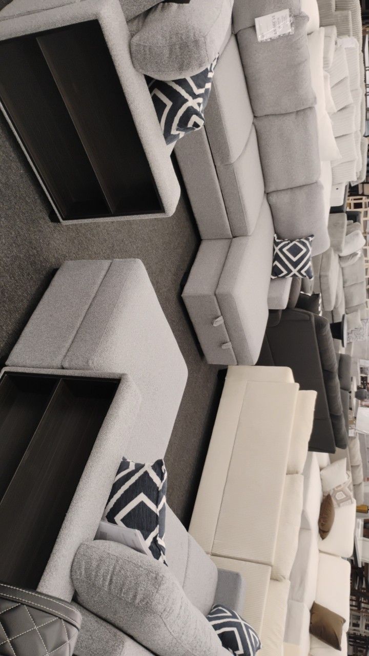 Modern Gray Sectional Sofa with Built-In Storage and Ottomans