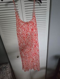 Beautiful summer dress, never been worn, light weight, shelf bra. Size L