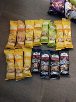 22 bags 2 1/2 oz Sea salt and shell pistachios salted whole peanuts salted whole honey roasted and sweet and tangy BBQ pistachios.delux salted mixed n