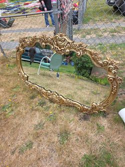 Large gold ornate mirror
