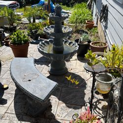 Water Fountain With Two Benches