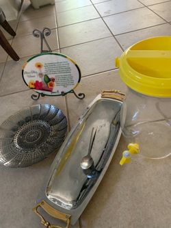 Four items for $3 (water jug, platter, poem decor, steamer