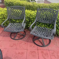2 Swerving Black Metal Chairs.