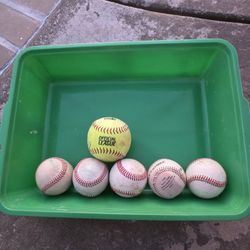 5 Baseballs & 1 Softball.
